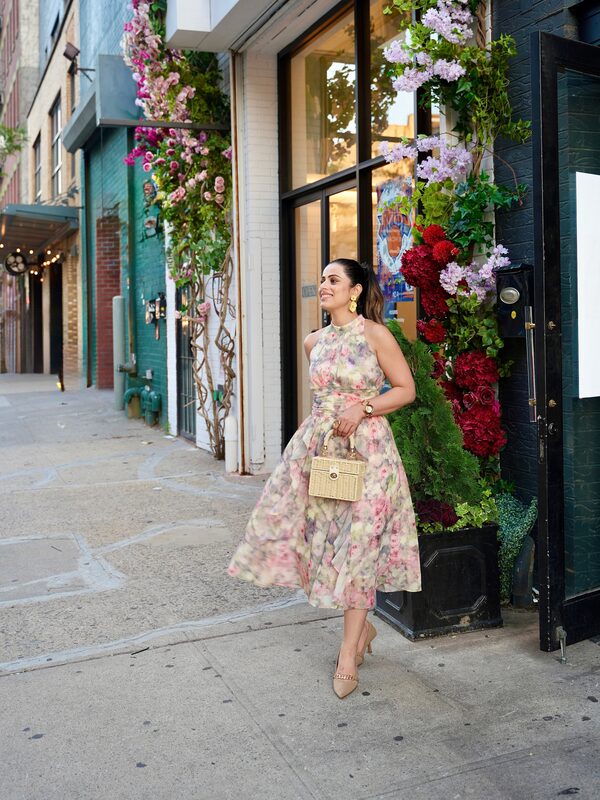 Roopsi Bansal in a floral dress with Cosy Island heels