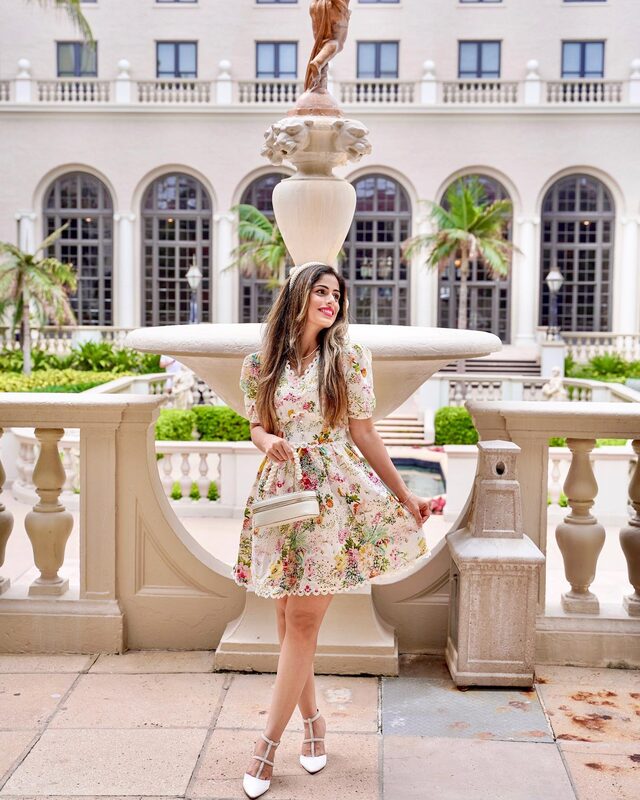 Roopsi Bansal in a colourful flower-buttoned crochet embroidered dress at The Breakers Hotel in Palm Beach