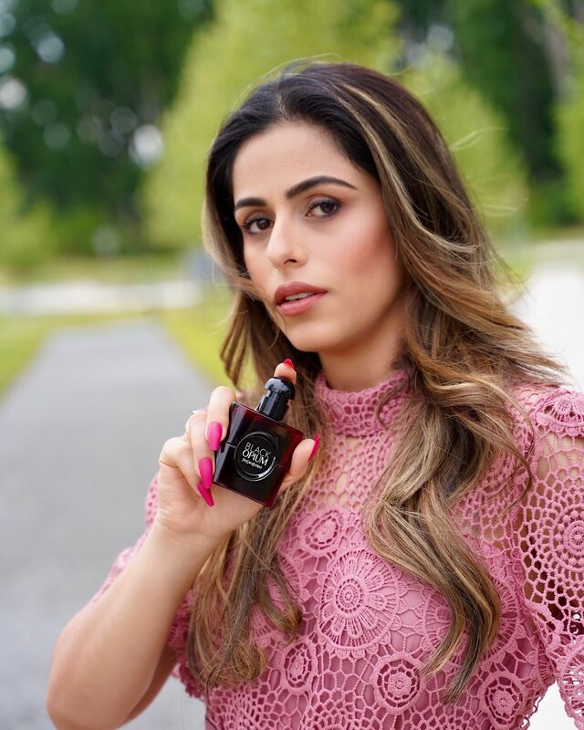 Roopsi Bansal with YSL Black Opium Eau de Parfum Over Red