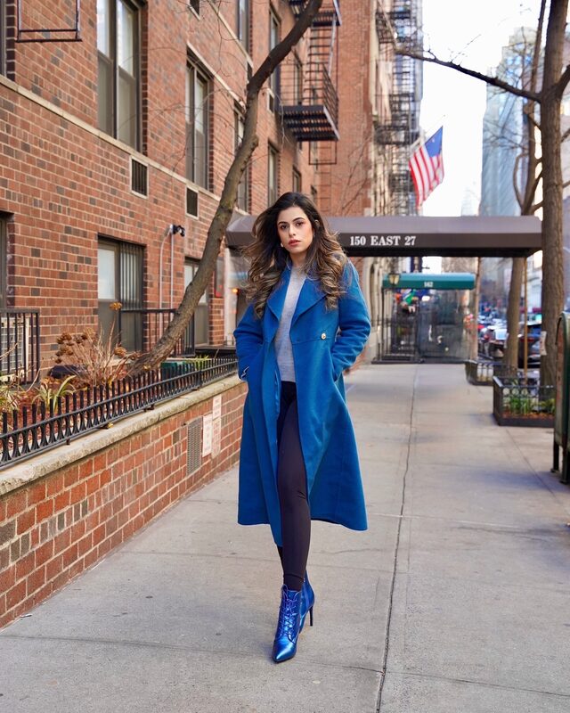 Roopsi Bansal wearing a coat from MOTF and boots from London Rag