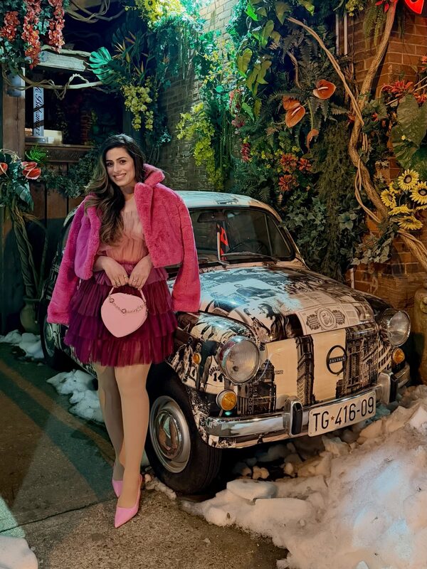 Roopsi Bansal in a pink outfit on a coffee run