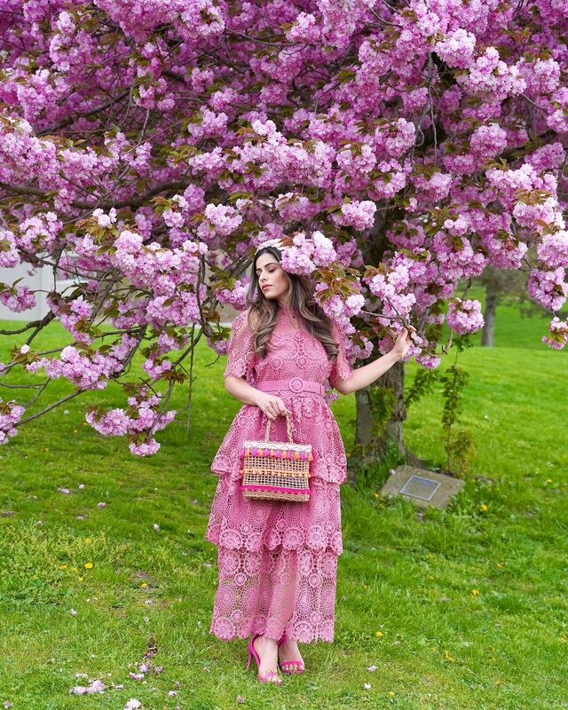 Roopsi Bansal in a lace dress and floral headband from Chicwish