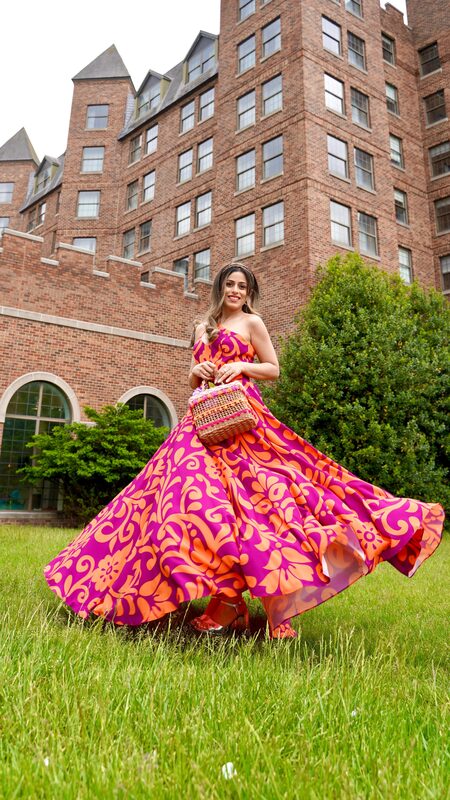 Roopsi Bansal in an orange and magenta print maxi dress from Mahamar
