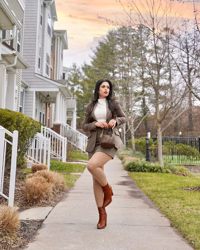 Roopsi Bansal in a wool blazer, sweater, and skirt set for a timeless elegant look