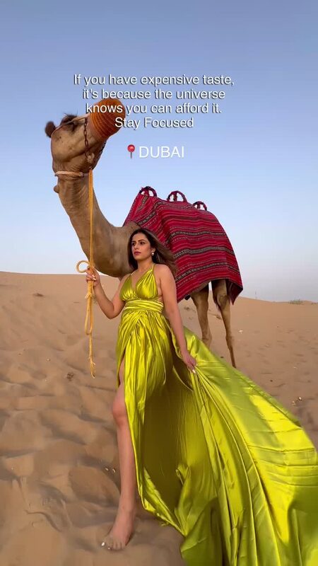 Roopsi Bansal at a Dubai desert sunset in a flowing dress