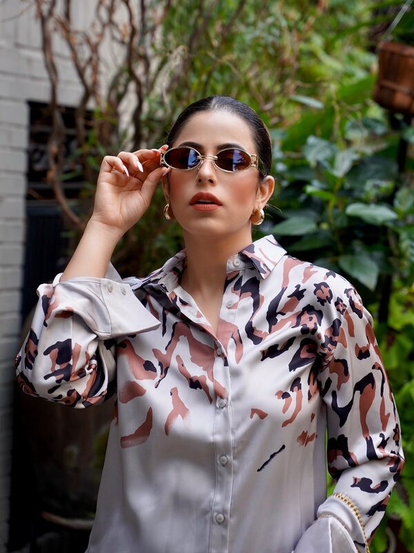 Roopsi Bansal in a satin autumn dress