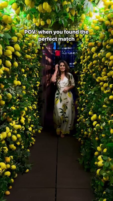 Roopsi Bansal in a lemon print maxi dress at PHD Terrace, New York City