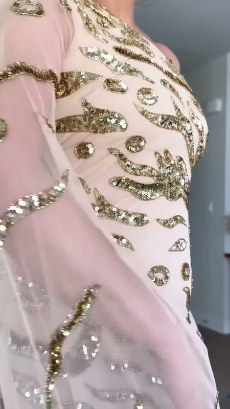 Roopsi Bansal wearing a one-shoulder cape dress from Frock and Frill