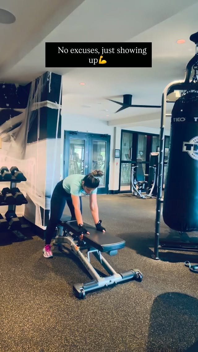 Roopsi Bansal working out on a weight bench in a gym