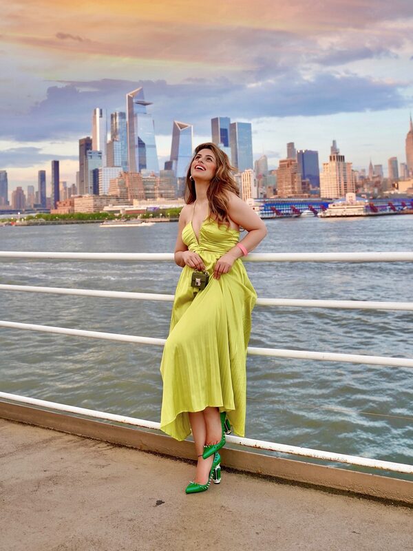 Roopsi Bansal wearing heels from Up2Step with an Ideal of Sweden bag
