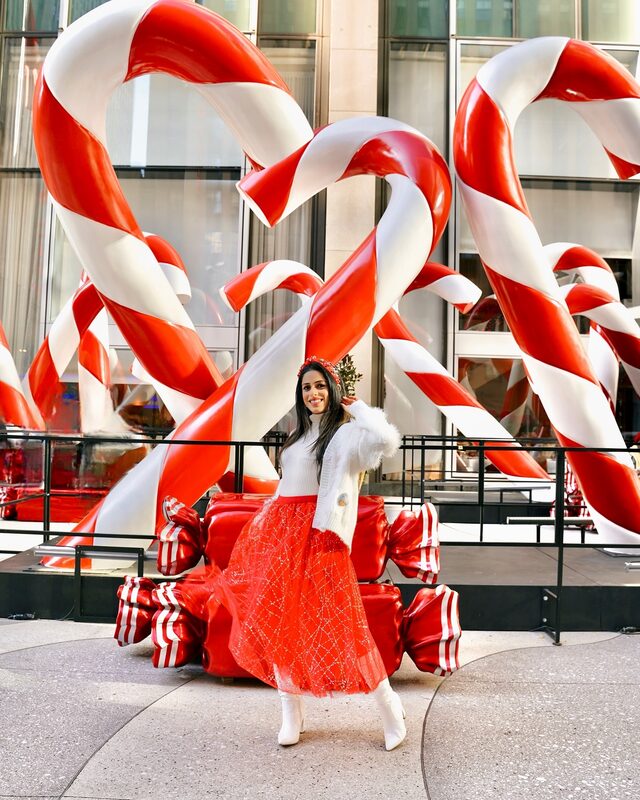 Roopsi Bansal in a candy-cane striped holiday look from Chicwish