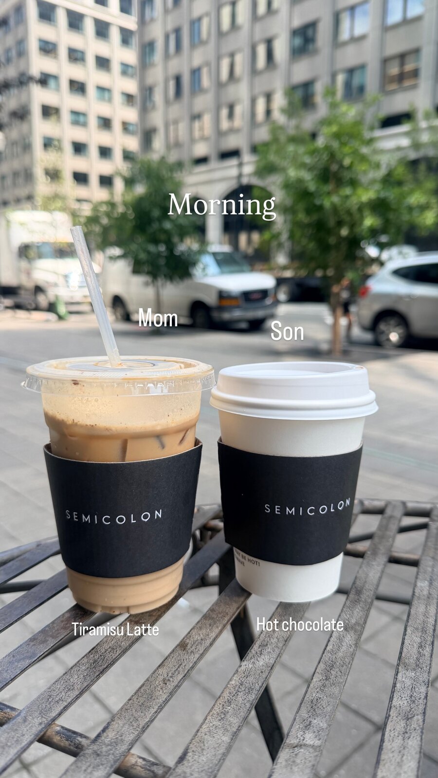 A Tiramisu Latte and a hot chocolate from Semicolon cafe on an outdoor table
