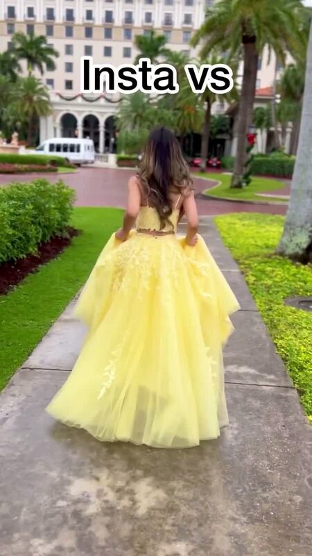 Roopsi Bansal from behind in a yellow lace two-piece ball gown, running down a palm-lined hotel path, with the text 'Insta vs' overlaid