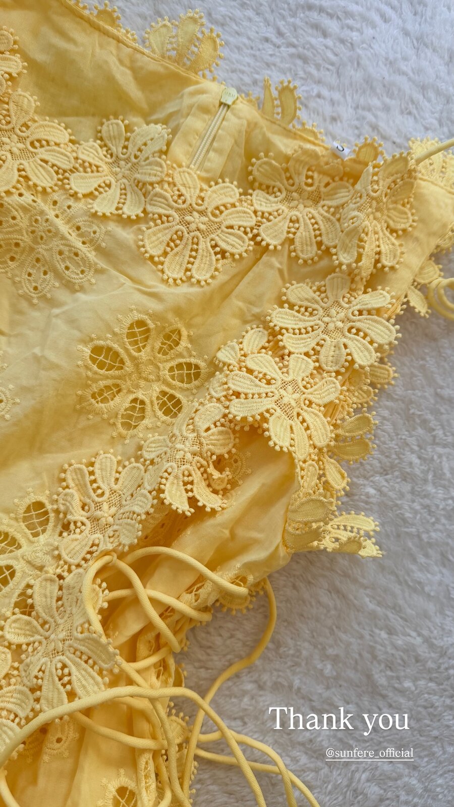 A yellow eyelet-lace garment from Sunfere Official