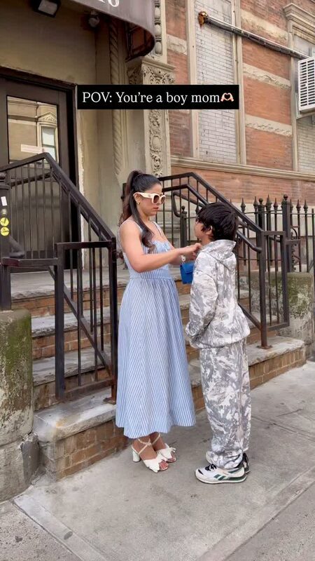 Roopsi Bansal with her son, wearing Dream Pairs heels