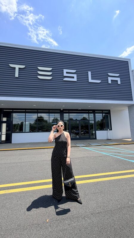 Roopsi Bansal with a Tesla Model 3
