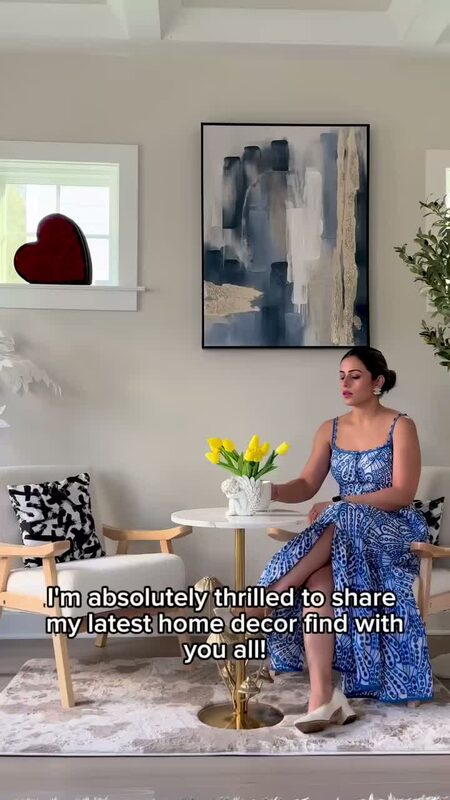 Roopsi Bansal with a new armchair from Comhoma in her sunroom