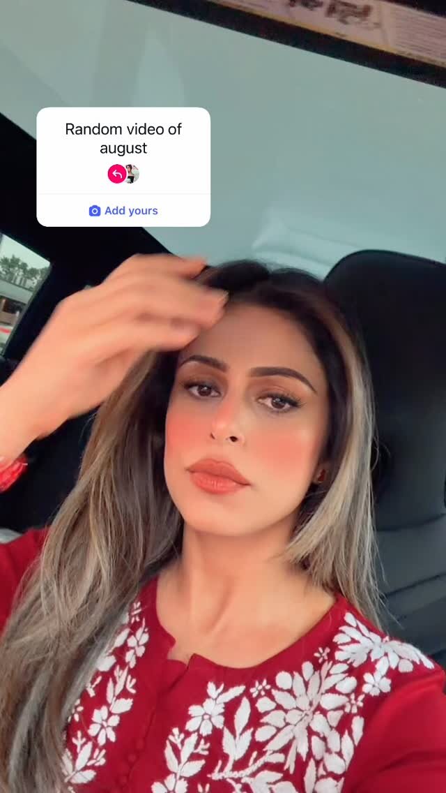 Roopsi Bansal in a car selfie, captioned Random video of august