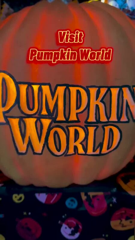 A lit-up Pumpkin World sign at Clover Stadium in Pomona, New York