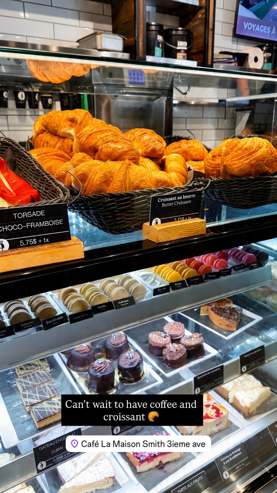 A bakery display case full of croissants and macarons at Cafe La Maison Smith, captioned Can't wait to have coffee and croissant