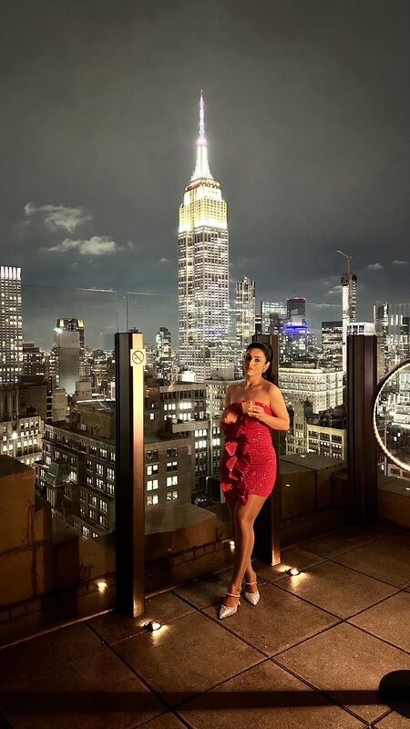 Roopsi Bansal in a sequin dress at the Skylark rooftop bar in NYC