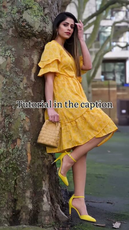 A tutorial reel demo frame in a yellow ruffled dress leaning against a tree, with on-screen text walking through the edit