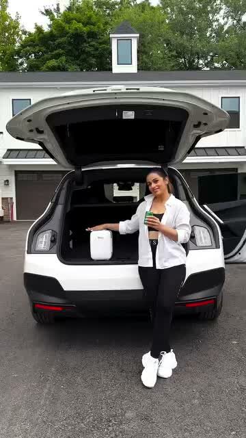 A compact mini fridge from Temu packed for a road trip