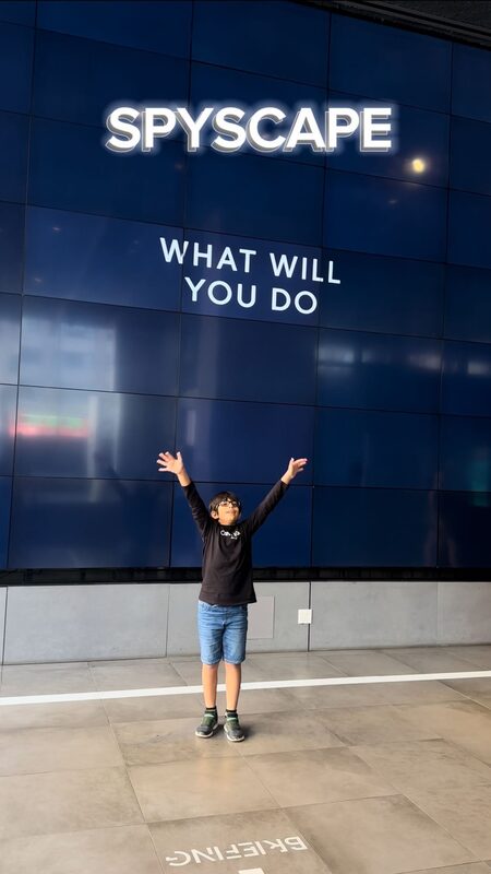 Roopsi Bansal exploring interactive spy exhibits at SPYSCAPE in NYC