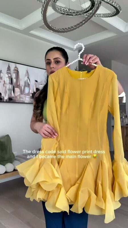 Roopsi Bansal in a floral dress, committing fully to the dress code