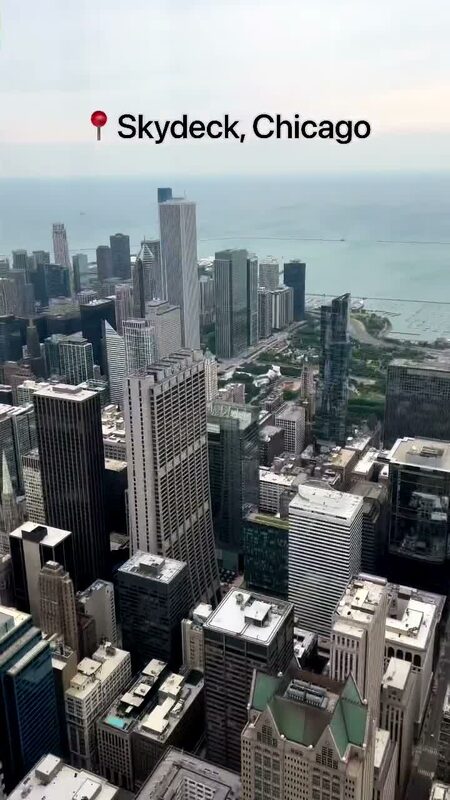 Aerial view of the Chicago skyline and Lake Michigan from The Ledge at Skydeck Chicago